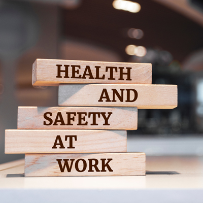wooden blocks displaying health and safety at work